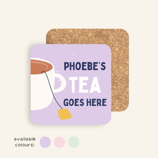Personalised Tea Goes Here coaster with custom name, glossy rounded-square finish and cork backing, available in five colours.